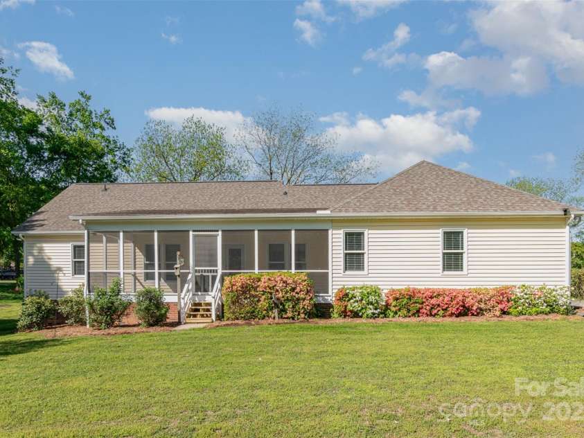 202 Oakwood Street, Stanfield, NC 28163.  MLS# CAR4224991, YatesRealty ID 9104. Back of Home with Screened Porch