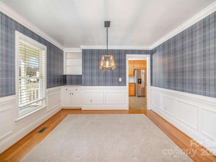 202 Oakwood Street, Stanfield, NC 28163.  MLS# CAR4224991, YatesRealty ID 9104. Dining Room with Built Ins