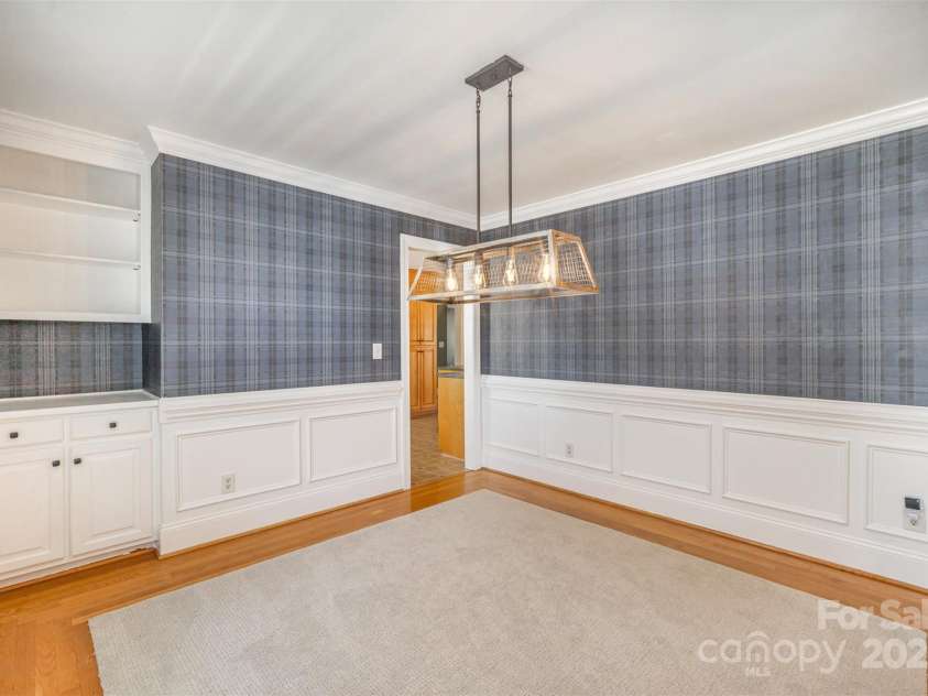 202 Oakwood Street, Stanfield, NC 28163.  MLS# CAR4224991, YatesRealty ID 9104. Dining Room with Built Ins