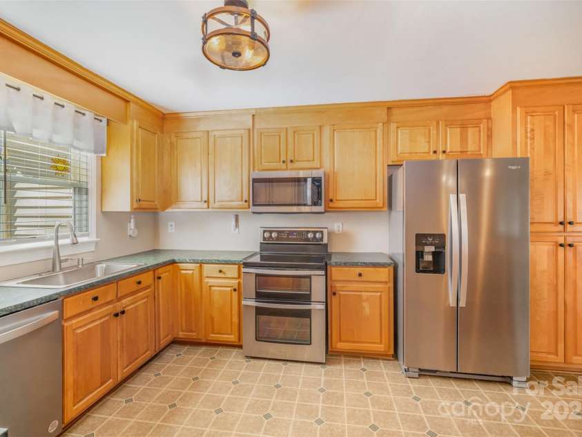 202 Oakwood Street, Stanfield, NC 28163.  MLS# CAR4224991, YatesRealty ID 9104. Kitchen Featuring Newer Stainless Steel Appliances