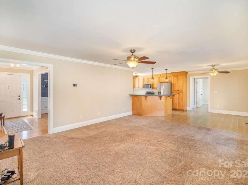 202 Oakwood Street, Stanfield, NC 28163.  MLS# CAR4224991, YatesRealty ID 9104. Living Room Overlooking Breakfast Nook and Kitchen