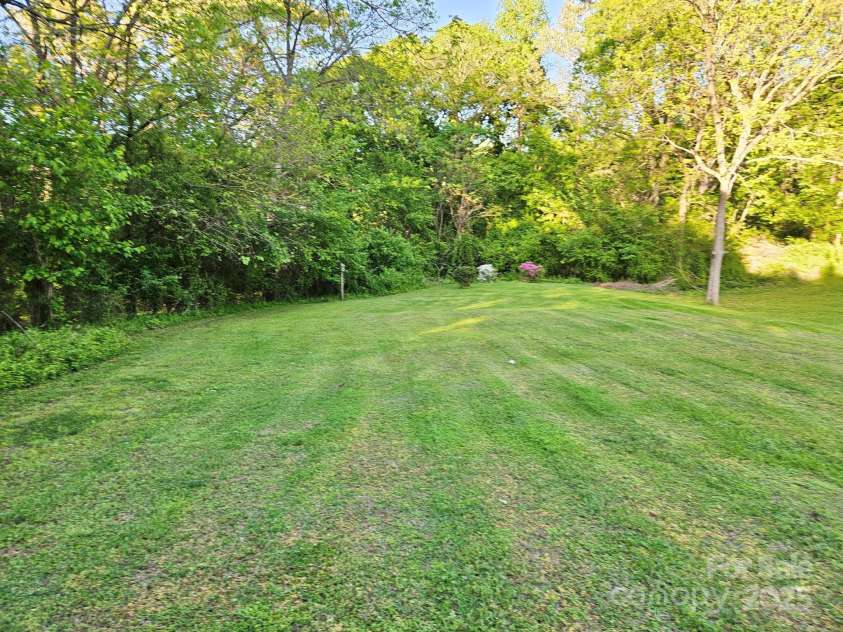 202 Oakwood Street, Stanfield, NC 28163.  MLS# CAR4224991, YatesRealty ID 9104. Peaceful Backyard