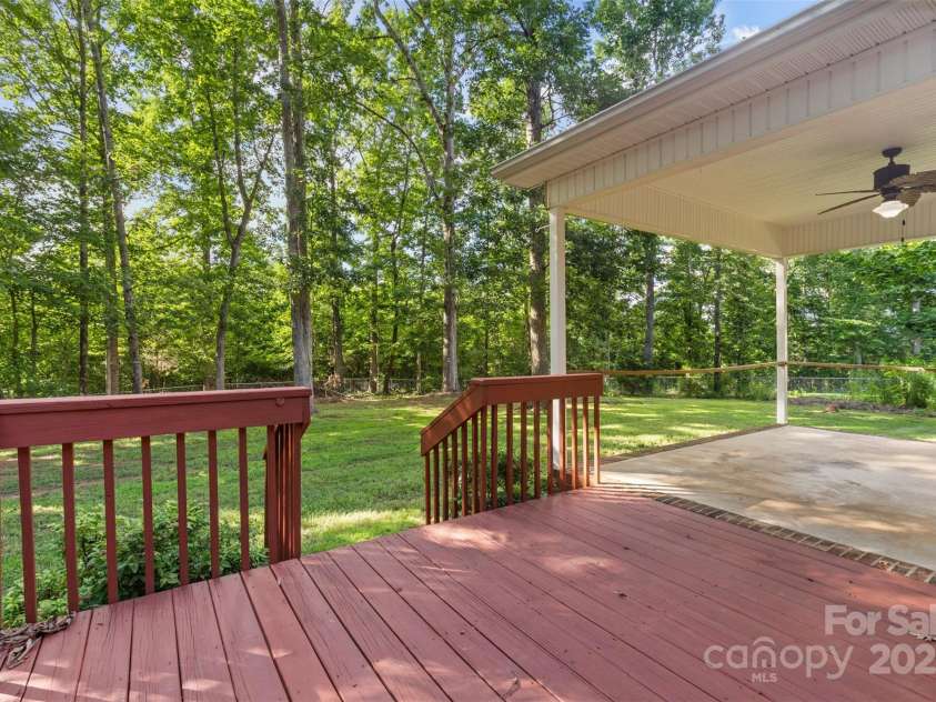 1313 Western Hills Lane, Vale, NC 28168.  MLS# CAR4272544, YatesRealty ID 9105. Expansive deck ideal for outdoor dining, grilling, and entertaining.