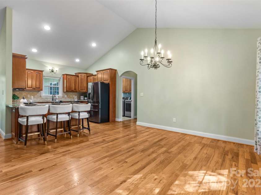 1313 Western Hills Lane, Vale, NC 28168.  MLS# CAR4272544, YatesRealty ID 9105. Open dining space perfect for gatherings or dinner parties.
