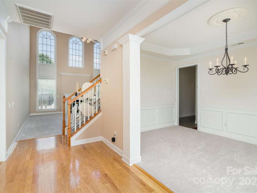 3007 Sandbox Circle, Indian Trail, NC 28079.  MLS# CAR4249895, YatesRealty ID 9108. Wood Floor entry with dining room to the right and master suite to the left.