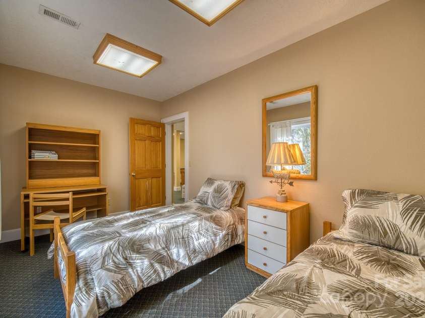 459 West Club Boulevard, Lake Toxaway, NC 28747.  MLS# CAR4220755, YatesRealty ID 911. Fourth bedroom basement level