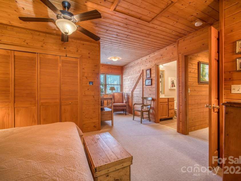 459 West Club Boulevard, Lake Toxaway, NC 28747.  MLS# CAR4220755, YatesRealty ID 911. Second bedroom / upper level / sitting area