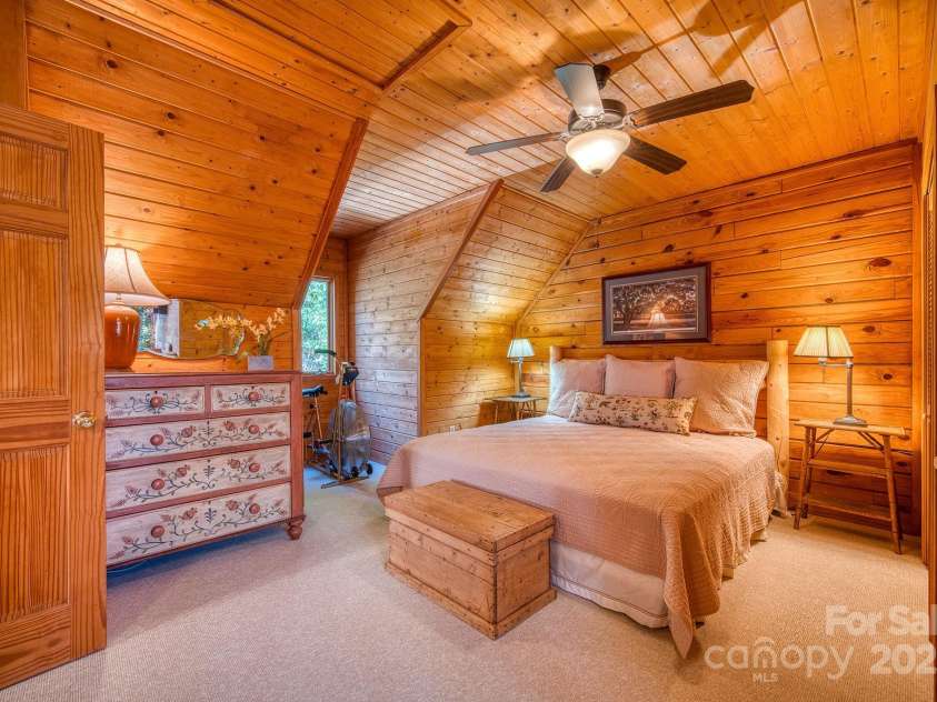 459 West Club Boulevard, Lake Toxaway, NC 28747.  MLS# CAR4220755, YatesRealty ID 911. Third bedroom with private bathroom king bed / upper level