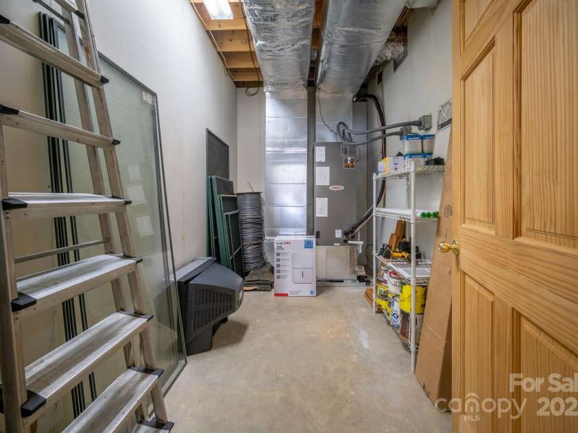 459 West Club Boulevard, Lake Toxaway, NC 28747.  MLS# CAR4220755, YatesRealty ID 911. Utility room / Basement level