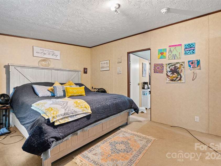 7686 Hickory Creek Drive, Denver, NC 28037.  MLS# CAR4187931, YatesRealty ID 9115. Primary bedroom