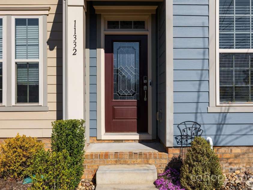 11332 Westbranch Parkway, Davidson, NC 28036.  MLS# CAR4235287, YatesRealty ID 9117. Covered entryway, handy for package deliveries!