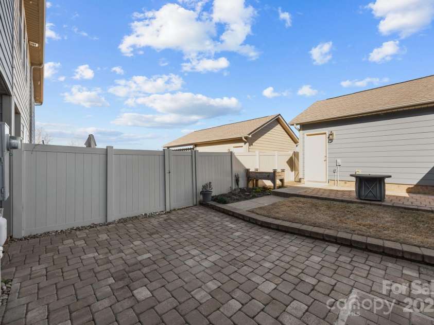 11332 Westbranch Parkway, Davidson, NC 28036.  MLS# CAR4235287, YatesRealty ID 9117. Fully fenced back yard leads to the detached garage