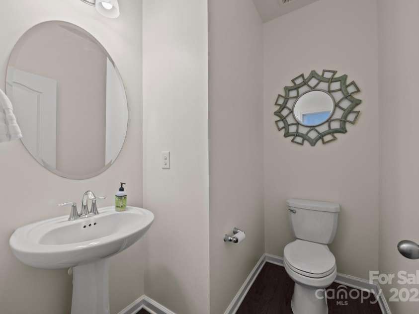 11332 Westbranch Parkway, Davidson, NC 28036.  MLS# CAR4235287, YatesRealty ID 9117. Half bathroom on the main level