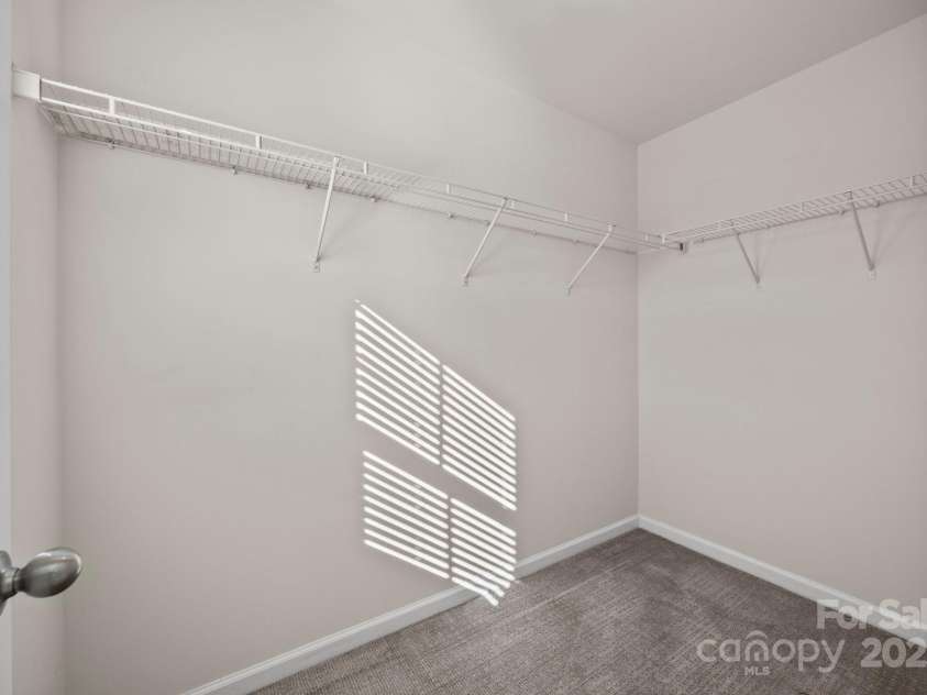 11332 Westbranch Parkway, Davidson, NC 28036.  MLS# CAR4235287, YatesRealty ID 9117. Huge walk-in closet for the third bedroom which has a window