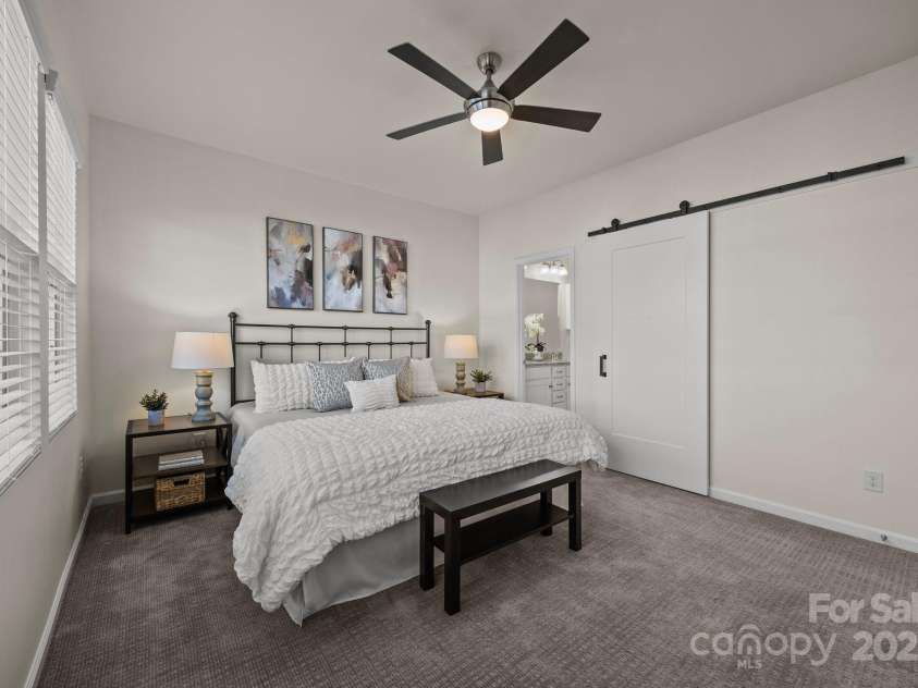 11332 Westbranch Parkway, Davidson, NC 28036.  MLS# CAR4235287, YatesRealty ID 9117. Sellers converted the closet door to barn style and added a ceiling fan