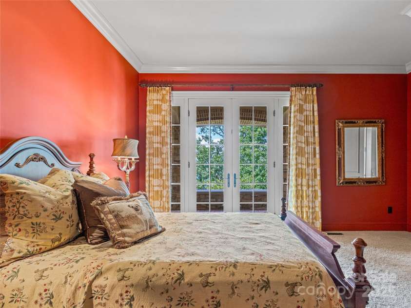 234 Skycliff Drive, Asheville, NC 28804.  MLS# CAR4280892, YatesRealty ID 9126. Bedroom overlooking Mtns view