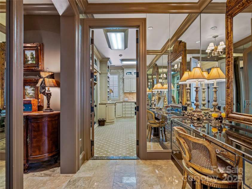 234 Skycliff Drive, Asheville, NC 28804.  MLS# CAR4280892, YatesRealty ID 9126. Vanity looking into Hers Closet