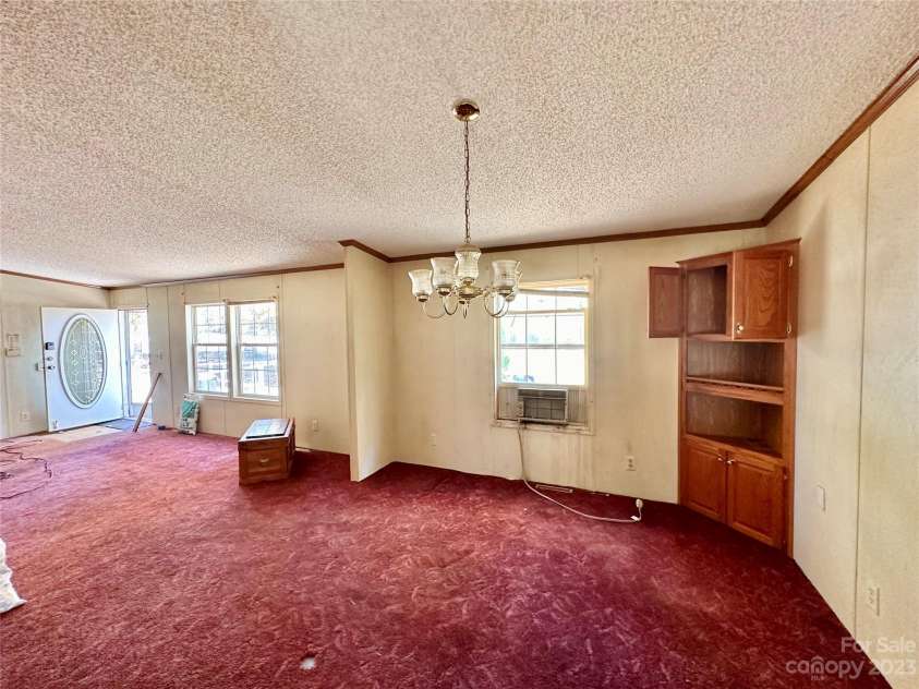 276 Ostwalt Amity Road, Troutman, NC 28166.  MLS# CAR4083302, YatesRealty ID 9126. Living Room