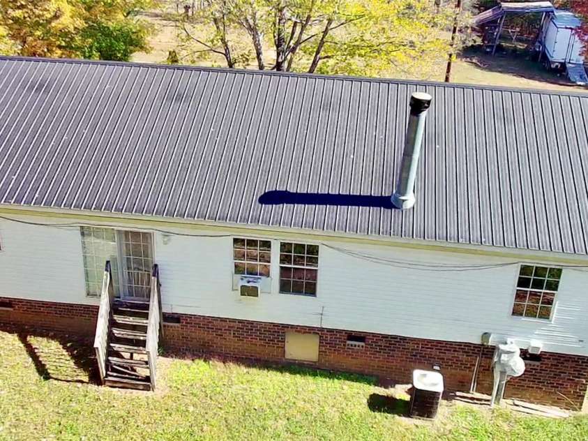 276 Ostwalt Amity Road, Troutman, NC 28166.  MLS# CAR4083302, YatesRealty ID 9126. Rear view