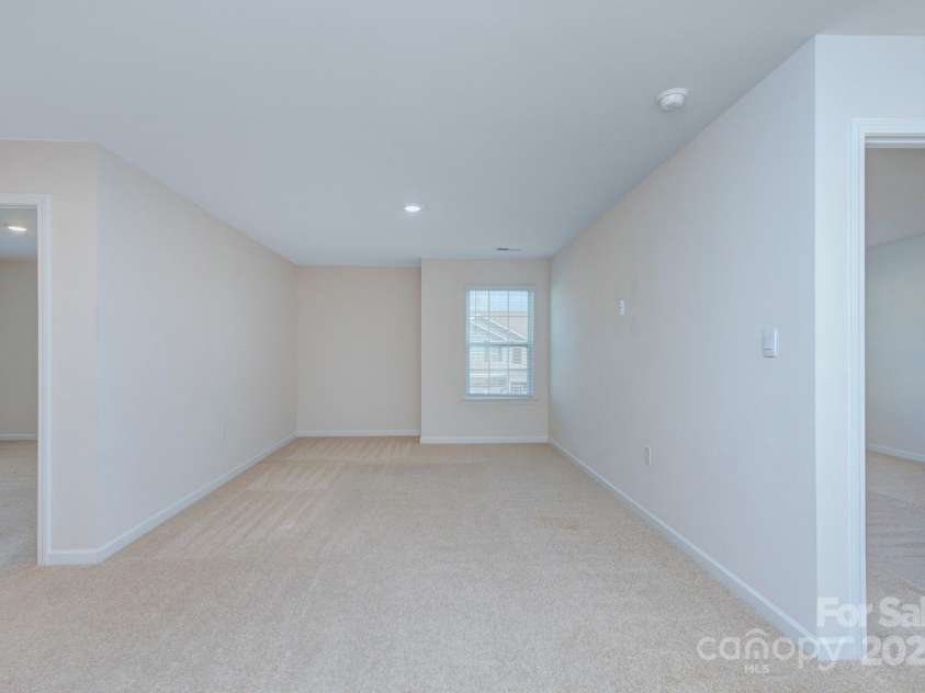 427 Carolina Hemlock Drive, Locust, NC 28097.  MLS# CAR4265067, YatesRealty ID 9127. Bonus Room/Loft measuring 22'2