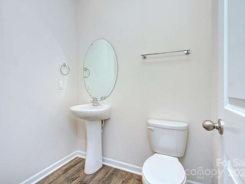 427 Carolina Hemlock Drive, Locust, NC 28097.  MLS# CAR4265067, YatesRealty ID 9127. Powder Room on mian
