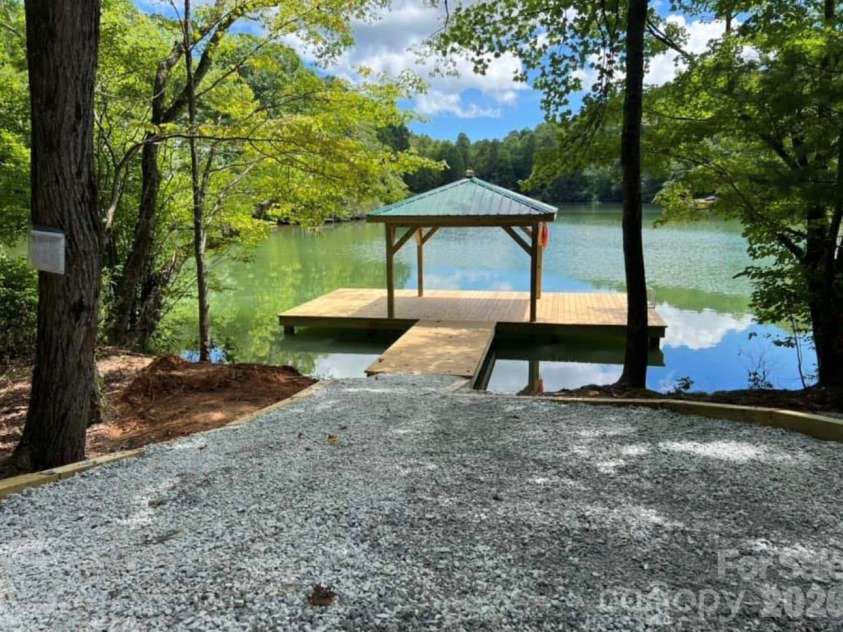 288 Willow Lane, Rosman, NC 28772.  MLS# CAR4361321, YatesRealty ID 9128. Community lake
