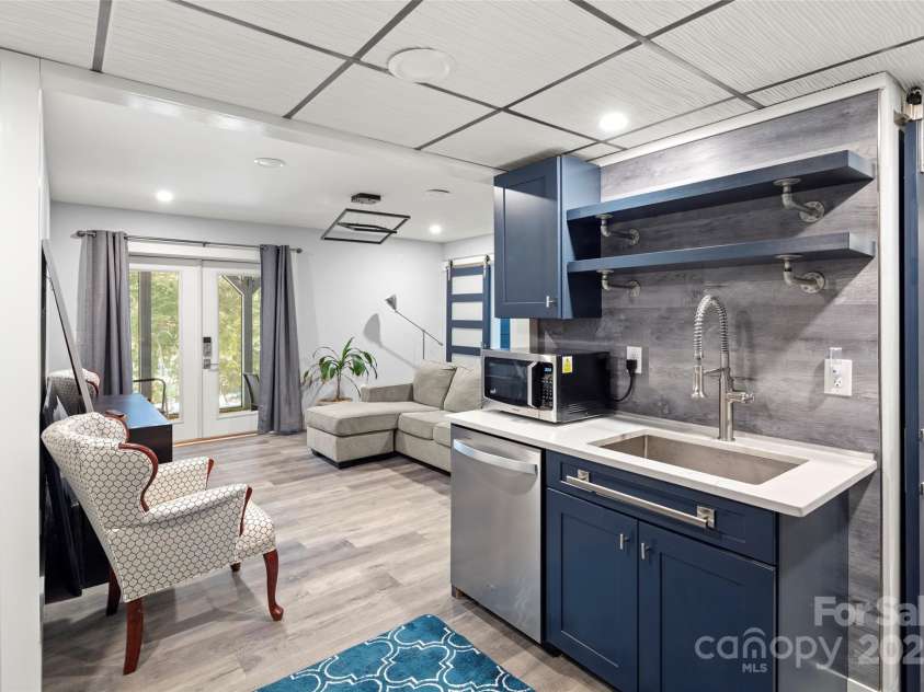 34 Turnberry Drive, Arden, NC 28704.  MLS# CAR4244900, YatesRealty ID 9128. Lower Level Apartment