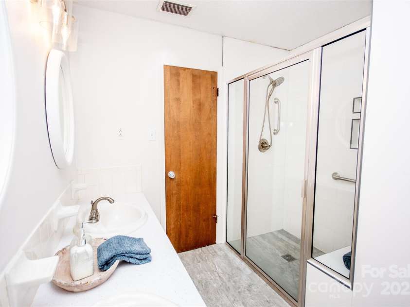 198 Dunlap Loop, Statesville, NC 28625.  MLS# CAR4197471, YatesRealty ID 9129. Full bath with recently renovated walk-in shower