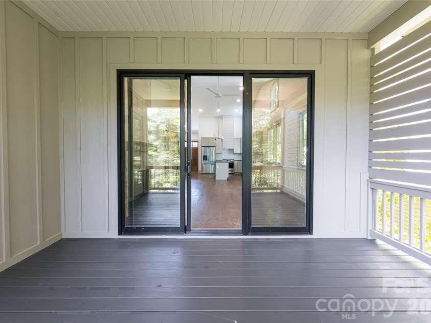 110 Unadilla Avenue, Asheville, NC 28803.  MLS# CAR4249602, YatesRealty ID 9132. Living room covered porch