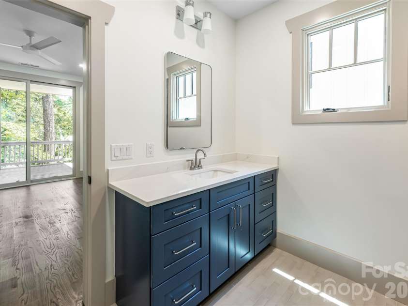 110 Unadilla Avenue, Asheville, NC 28803.  MLS# CAR4249602, YatesRealty ID 9132. Lower level bathroom