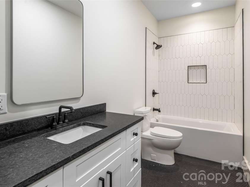 110 Unadilla Avenue, Asheville, NC 28803.  MLS# CAR4249602, YatesRealty ID 9132. Lower level bathroom