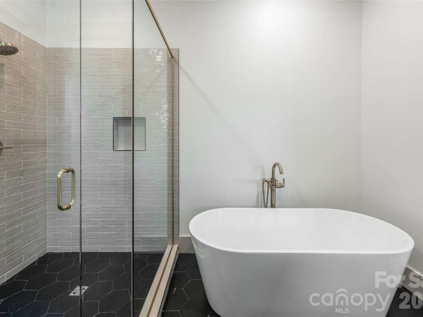 110 Unadilla Avenue, Asheville, NC 28803.  MLS# CAR4249602, YatesRealty ID 9132. Primary suite bathroom