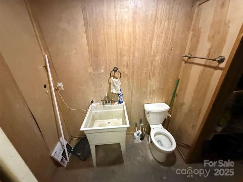 375 Sheppard Branch Road, Weaverville, NC 28787.  MLS# CAR4228322, YatesRealty ID 9134. Basement bathroom with closet that can easily be turned into a shower for a full bathroom.