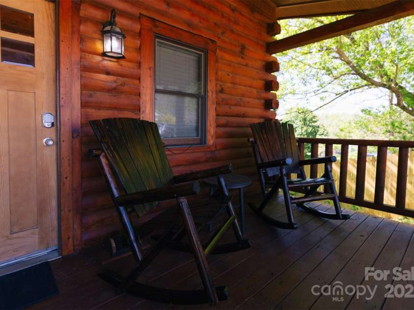 375 Sheppard Branch Road, Weaverville, NC 28787.  MLS# CAR4228322, YatesRealty ID 9134. Enjoy sipping your morning coffee while rocking on your front porch