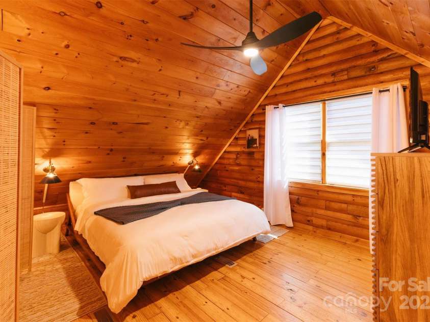 375 Sheppard Branch Road, Weaverville, NC 28787.  MLS# CAR4228322, YatesRealty ID 9134. Loft space includes a closet and is perfect for a guest bedroom