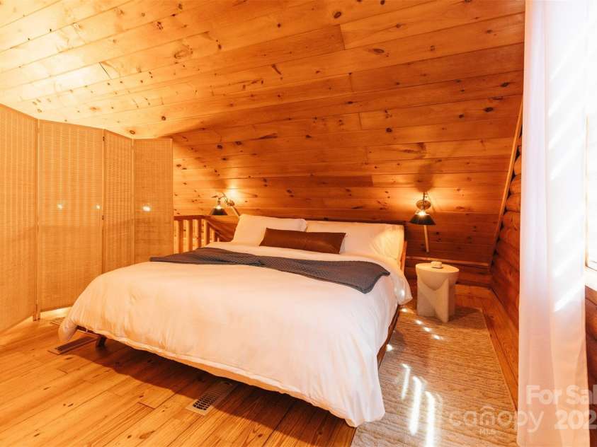 375 Sheppard Branch Road, Weaverville, NC 28787.  MLS# CAR4228322, YatesRealty ID 9134. Loft space includes a closet and is perfect for a guest bedroom