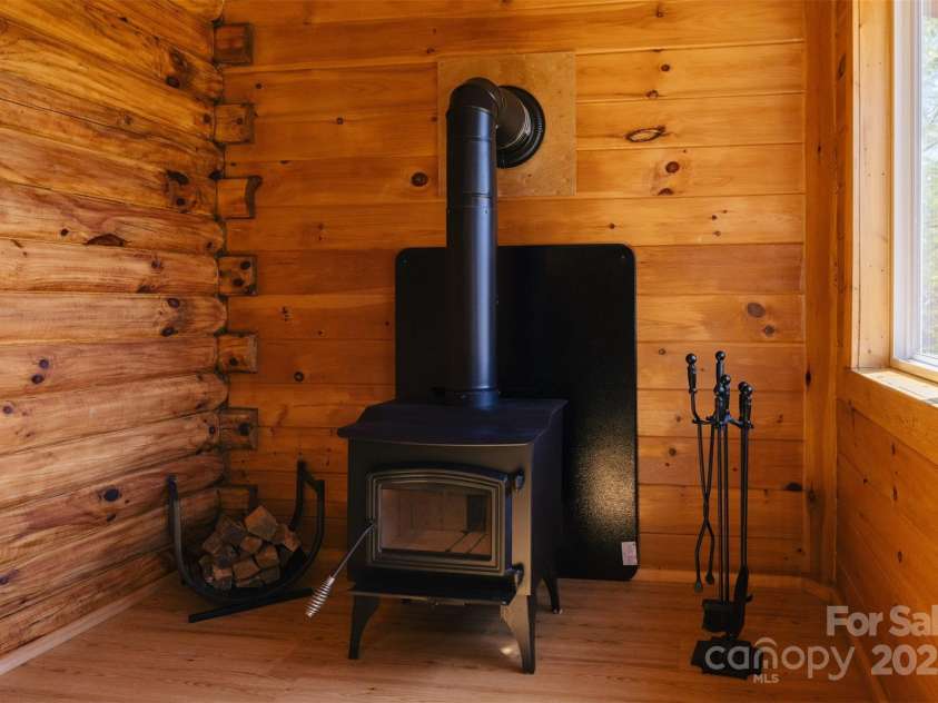 375 Sheppard Branch Road, Weaverville, NC 28787.  MLS# CAR4228322, YatesRealty ID 9134. Woodstove