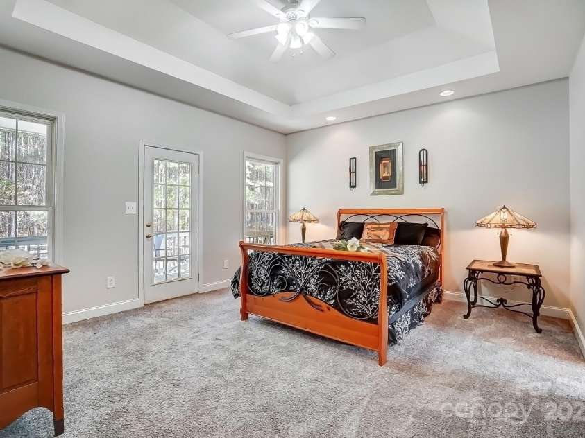932 Dovefield Drive, York, SC 29745.  MLS# CAR4228457, YatesRealty ID 9139. Primary bedroom on the main floor which connects to the covered back porch.