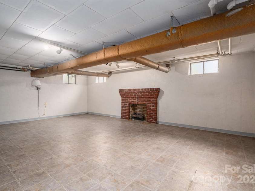 424 College Avenue, Newton, NC 28658.  MLS# CAR4189231, YatesRealty ID 9142. Basement Den