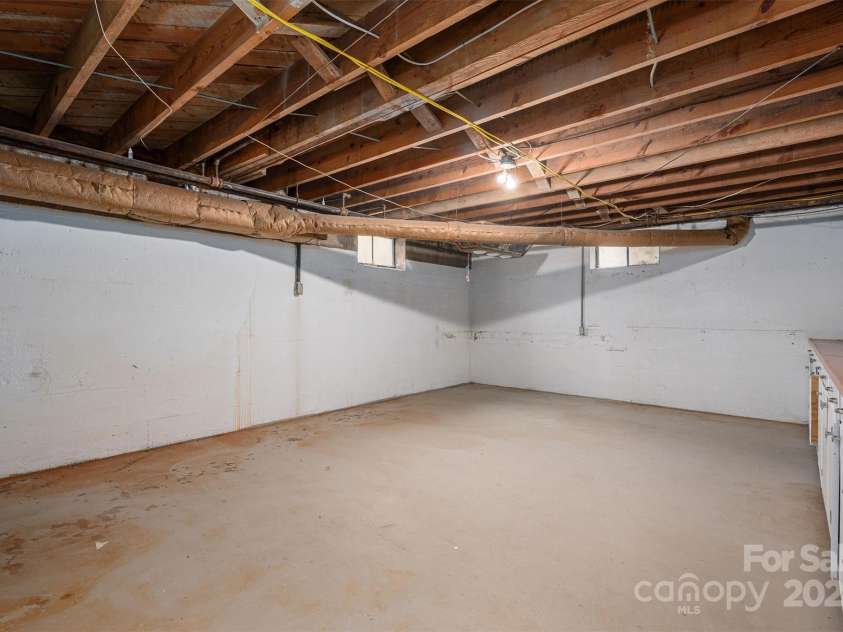 424 College Avenue, Newton, NC 28658.  MLS# CAR4189231, YatesRealty ID 9142. Basement Storage