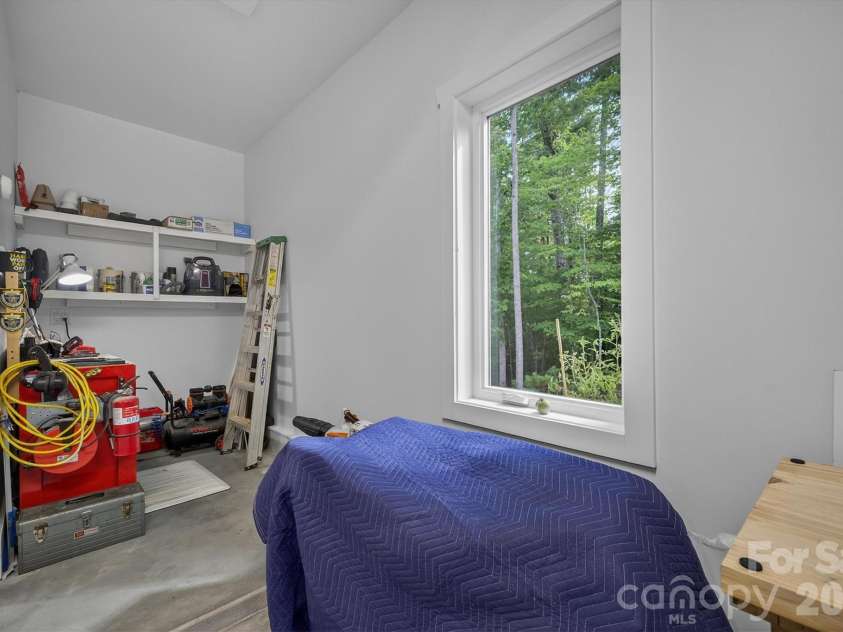 217 Sycamore Drive, Nebo, NC 28761.  MLS# CAR4364712, YatesRealty ID 9148. Garage and Storage Area Main Level