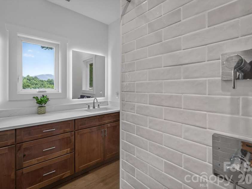 217 Sycamore Drive, Nebo, NC 28761.  MLS# CAR4364712, YatesRealty ID 9148. Primary Bathroom