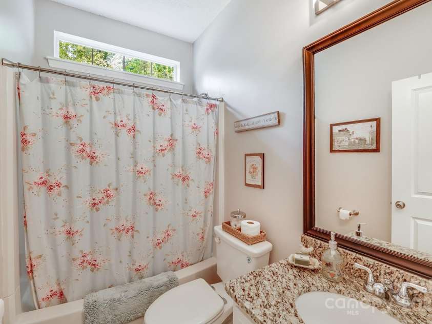 11003 Pale Hickory Lane, Charlotte, NC 28215.  MLS# CAR4234435, YatesRealty ID 9156. Guest Bath