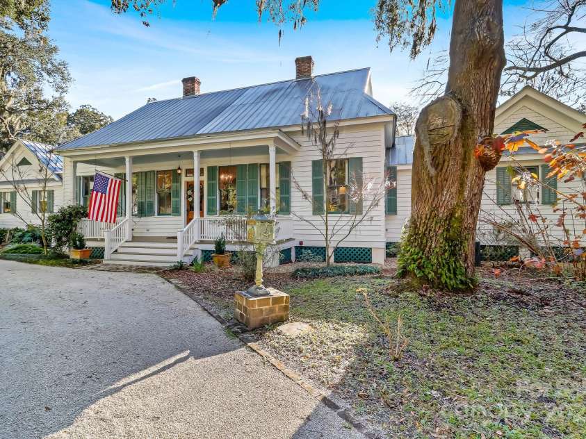 131 Pritchard Street, Bluffton, SC 29910.  MLS# CAR4214365, YatesRealty ID 916. Carolina Farmhouse architecture along with Queen Anne-style