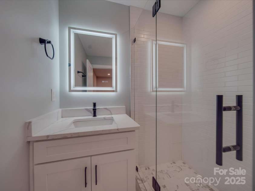 908 Davenport Street, Charlotte, NC 28208.  MLS# CAR4223250, YatesRealty ID 916. Primary bathroom