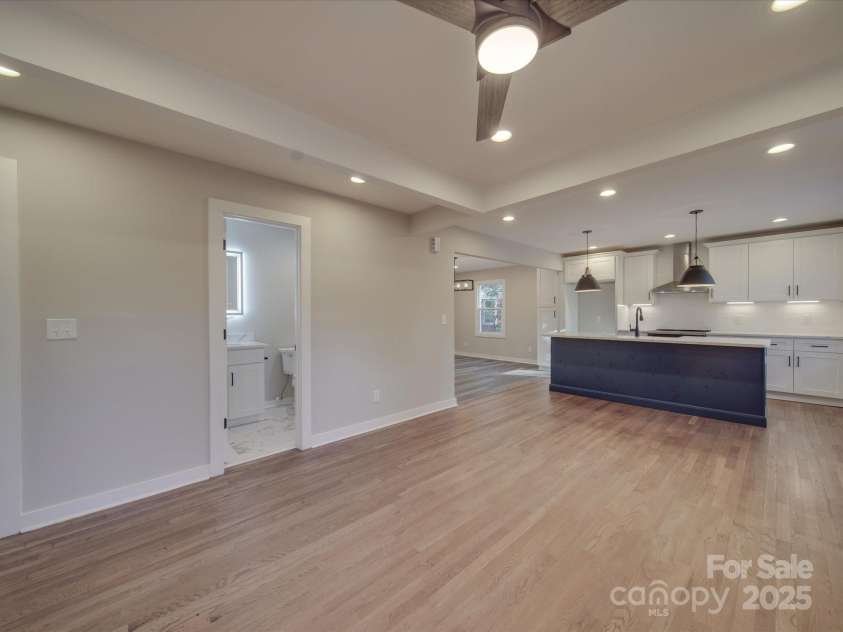 908 Davenport Street, Charlotte, NC 28208.  MLS# CAR4223250, YatesRealty ID 916. Refinished floors in the living area