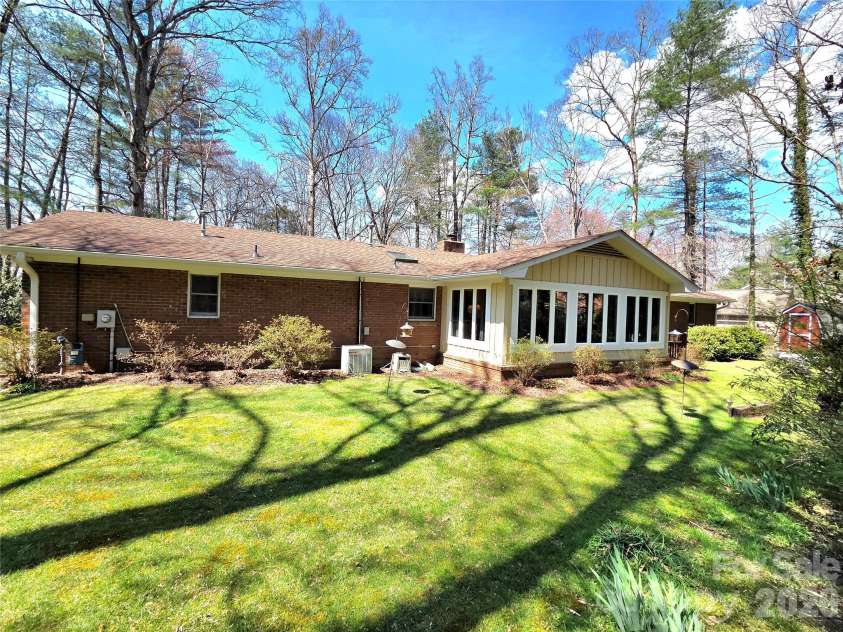 106 Laurel Lane, Etowah, NC 28729.  MLS# CAR4354319, YatesRealty ID 9161. Back yard 