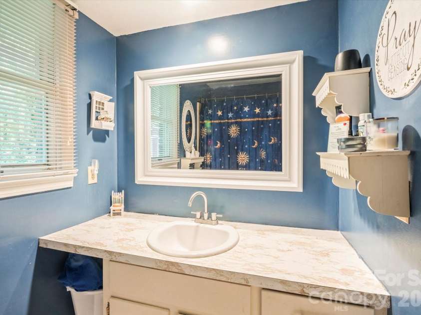 106 Laurel Lane, Etowah, NC 28729.  MLS# CAR4354319, YatesRealty ID 9161. Bath vanity