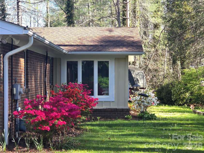 106 Laurel Lane, Etowah, NC 28729.  MLS# CAR4354319, YatesRealty ID 9161. Beautiful spring azaleas in bloom