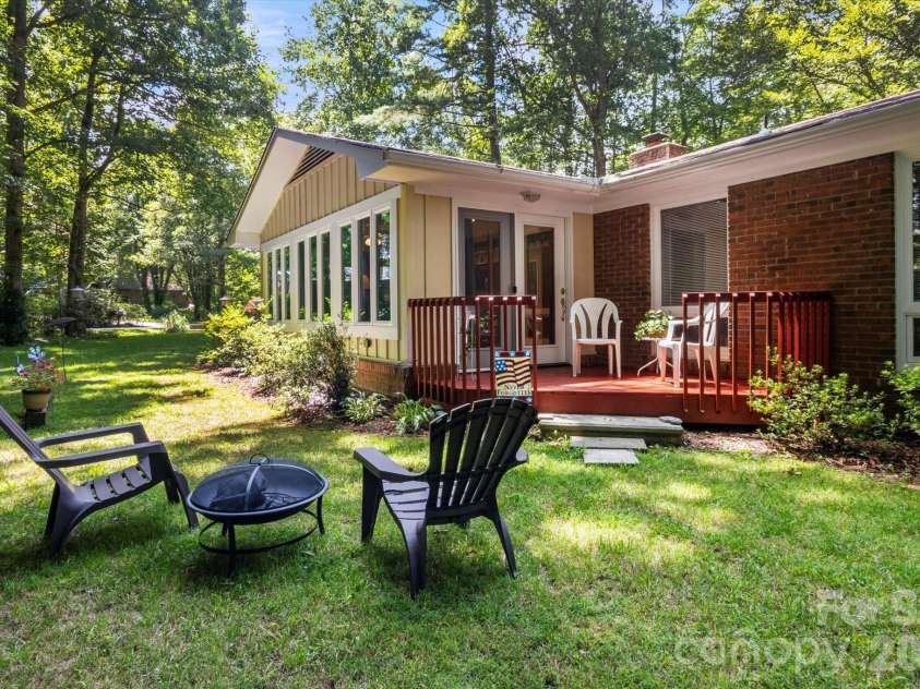 106 Laurel Lane, Etowah, NC 28729.  MLS# CAR4354319, YatesRealty ID 9161. Deck and firepit